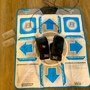 Dance mat - boxing gloves - control holders for a wii console.